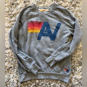 Aviator Nation Grey Crewneck with Red, Blue & Yellow Stripe 'A' Graphic